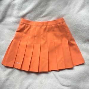 Head Sportswear orange tennis skirt size small